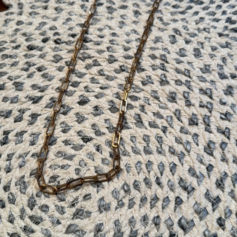 Gold paper clip chain sunglass/glass holder